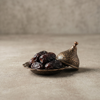 Premium Ajwa Dates on a stone surface, premium gift